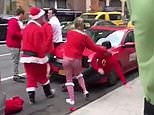 NYC SantaCon: Man passes out and causes a woman to trip over him