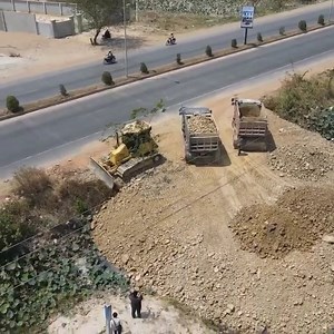 Land Filling Process operator by DR 51PX Bulldozer Dump Truck Spreading Rock Source : Mr Machines at YouTube channel | Alat Berat Mania