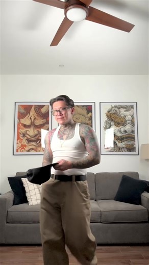 Embracing 90s Street Style with Snapbacks and Tattoos