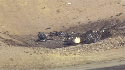 Helicopter footage shows wreck of 'mid-air collision' that left two dead