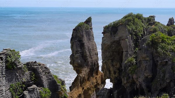 Layered limestone Pancake Rocks in Punakaiki, nestled within New Zealand's Paparoa National Park
