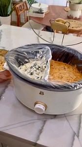 529K views · 58K reactions | Did you know you can make two dips in ONE slow cooker?! 勞 Just use foil as a divider, toss a slow cooker liner over it, and boom—dip perfection!  Comment TWO below and we’ll DM ya the two dips shown in this video that you HAVE to try—so dang good!  #CrockpotHacks #DipGameStrong #TailgateEats #EasyRecipes #FoodieFinds @beautifulbydrew @reynoldsbrands | Hip2Save | Facebook