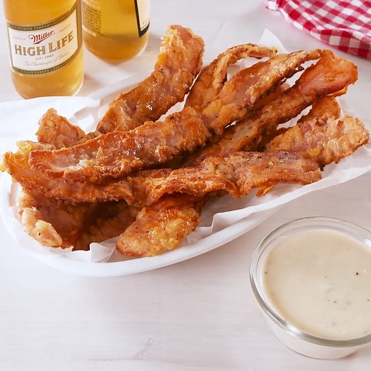 You'll hate how much you love this Chicken Fried Bacon 😩 Full recipe: http://dlsh.it/eoKtaWP | Delish