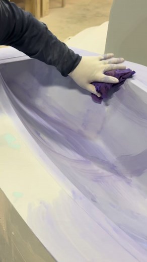 Applying a guide coat to a plug before sanding gives visual feedback so high and low spots, pinholes, and scratches are easier to see and correct before the plug completed. #MarineManufacturing #BoatBuilding #CompositeTooling #PlugBuilding #GuideCoat #SurfacePrep #HighBuildPrimer #FiberglassMolds #Composites #ToolingProcess #ShopProcess #BehindTheBuild | NuWave Composites