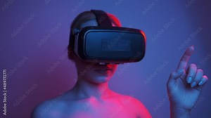 The woman in VR glasses is in the metaverse universe, futuristic virtual reality environments in NFT