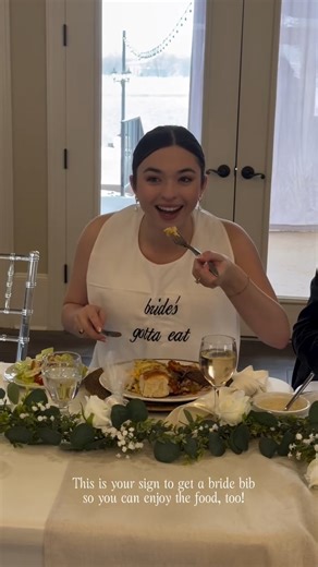 This is your sign to get a bride bib so you can enjoy your food on your wedding day 😂 Credit: @momentsbymaceyrook | ModernWedding