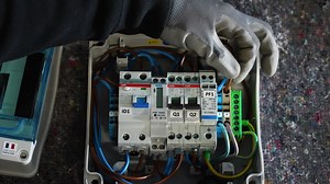 Premium stock video - Electrician repairing electrical circuits