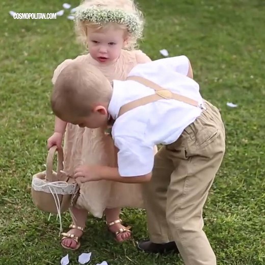 OMG the one flower girl who laid down during the ceremony 😂😂 More flower girls: http://bit.ly/2sZtxxv | Cosmopolitan
