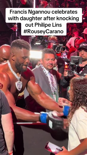 Francis Ngannou celebrates with daughter after knocking out Philipe Lins #RouseyCarano @MVP - Most Valuable Promotions