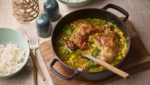 Golden chicken legs over curried corn and coconut recipe