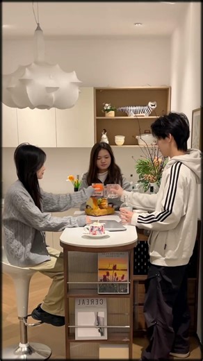 This Rotating Cabinet Bar Transforms Small Spaces Into a Stylish Workspace and Dining Table