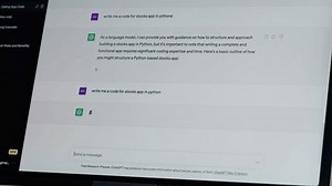 SPAIN, BARCELONA, 1 APRIL 2023: Man work with chat gpt AI online, connecting with AI and using a chat GPT. IT engineer software developer programmer interact with chat bot, making writing code.