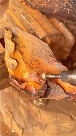 using a manual rasp and power rotary tools to carve and shape the wood surface in creative design