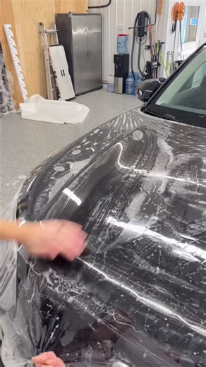 Wraps by Drive Protected on Instagram: "9 Second Hood Install  . . . . . #defense+ #driveprotected™️ #ppf #paintprotectionfilm #paintprotection #asmr #asmrvideo #satisfying #reels #good #fun #satisfyingasmr #teslalife #teslappf #cars #car #carwrap"