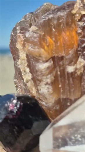 Painite natural glow brownish orange