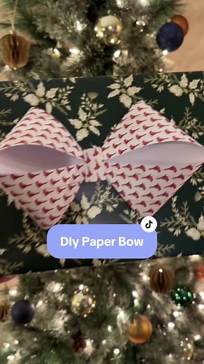 How to make a paper bow for gift wrapping! #christmaswrappingtips #christmaswrapping #giftwrappinghacks #giftwrapping #giftwrappingideas