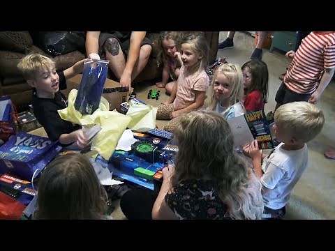 It's Max's Birthday Party! We rented a Huge inflatable Bounce House! Max Opens Birthday Presents