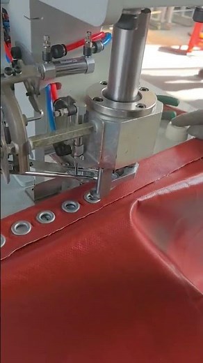 automatic eyelet punching machine