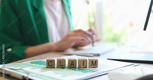 Person prints claim document for client to insurance company on computer. Insurance and cash compensation concept