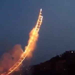 SO COOOL. Cai Guogiang's dazzling tribute to his grandmother! A fiery ladder made of fireworks climbs its way 1,650ft into the sky! More here: http://www.booooooom.com/2015/08/11/cai-guoqiangs-dazzling-1650ft-sky-ladder-made-of-fireworks-climbs-into-the-heavens/ | Booooooom.com
