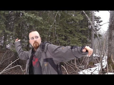 Practicing axe throwing with the SOG Fasthawk