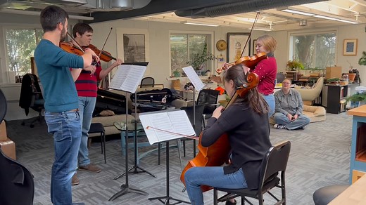 Thanks to the Griffon String Quartet for paying a visit to the office Tuesday! Beautiful music that even calmed Oxford down for a few minutes. | Peninsula Pulse Newspaper