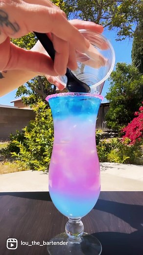 The Sleeping Beauty 1oz hpnotiq 2oz calypso triple melon lemonade 2oz grapefruit soda 1/2oz blue curaçao 2oz tequila Rim with pink sugar #drinks #cocktail #sleepingbeauty #pinkcocktail #hpnotiq #tequila #tequilacocktail #sundayfunday