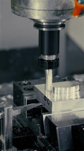 CNC Machine transforming raw material into a finished component