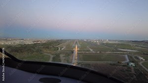 timelapse of airplane aircraft jet landing at airport runway touchdown arriving arrival travel transport cockpit view dusk evening aviation