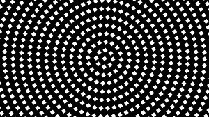 A black and white pattern with a circle in the center