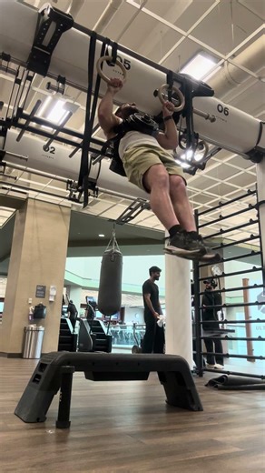 Weighted Standard Pull Ups (6.4 reps 35 lbs)