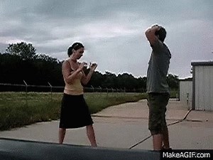 Girl kicks man in the nuts on Make a GIF