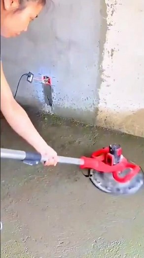 Smoothing freshly applied concrete surface using an electric power trowel for a refined floor finish