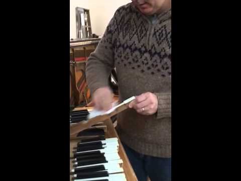 Cleaning the ivory keys of your piano