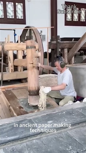 The ancient papermaking process of using a water pestle hammer to beat paper
