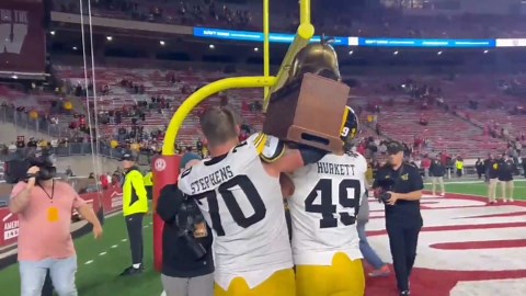 Hawkeyes head home with the Heartland Trophy after a 37-0 shutout at Wisconsin
