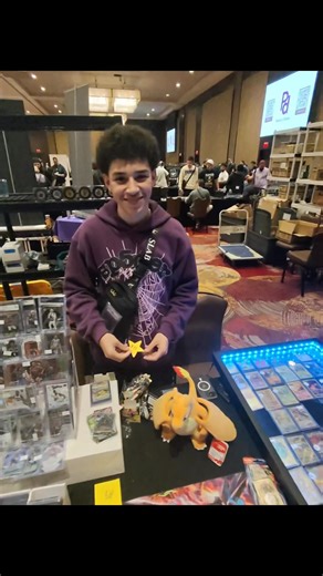 POV: Insane charizard pokemon tin coin flip (I won)