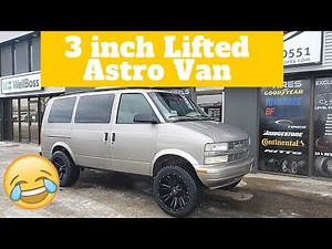 lifted Chevy Astro Van on 20x10 -18 wheels