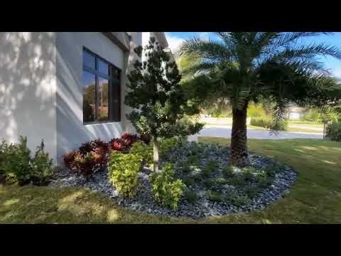 Modern Landscape Installation for Dell Development in Jupiter, FL | Robusta Sylvester Palm Showcase
