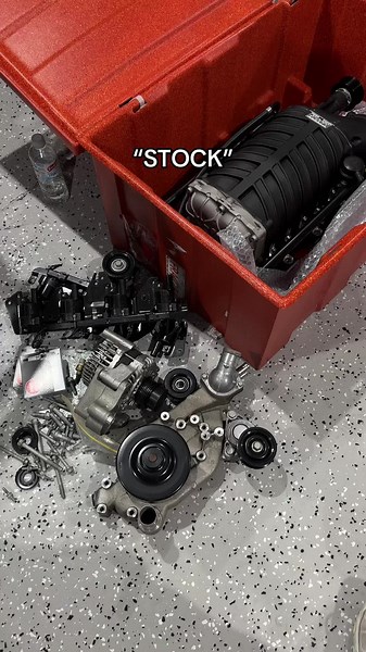 Car Engine Installation Process in a Workshop