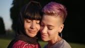 Beautiful lesbian muslim woman in hijab with her girlfriend.