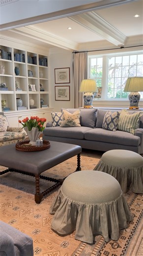 Classic blues 💙 @Samanthavarvel’s Carlisle Sofas are the perfect foundation for a timeless living room. Beautiful crafted details like spindle legs, rolled pleated arms, and a curved silhouette create a classic look with unparalleled comfort. Make it yours: https://bit.ly/3FPe0dD #mypotterybarn | Pottery Barn