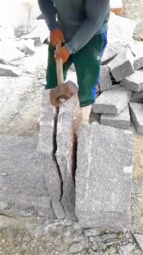 Manually Splitting a Solid Stone Block Using a Hammer Tool for Precise Construction Work #shorts