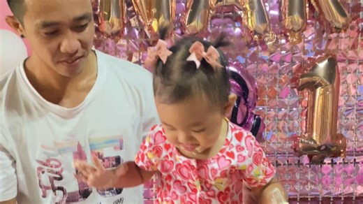 Dad tries to stop birthday girl from cake smash but she succeeds