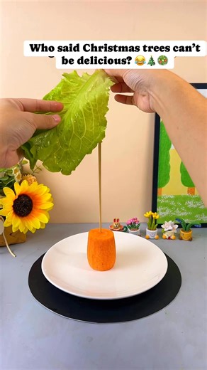 Molly | teacher | traveler🤍✈️ on Instagram: "A Christmas tree you can EAT! 🎄🥗 Made from salad leaves and carrots—fun, healthy, and super cute for your holiday table! #ChristmasFood #HolidayRecipes #ChristmasDIY #FestiveIdeas #FoodArt #CreativeCooking #ChristmasTable #HealthyChristmas #ChristmasSnacks #HolidayPartyIdeas"