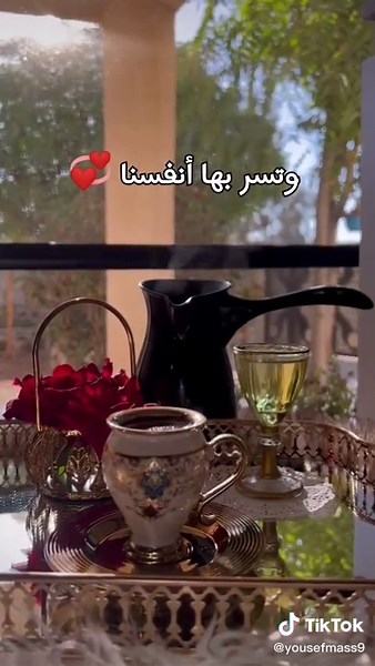 Beautiful Tea Set Display with Red Roses