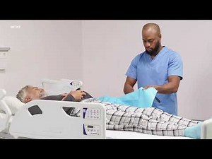 Applying Slide sheets under the patient | Patient Handling​ | Arjo Global