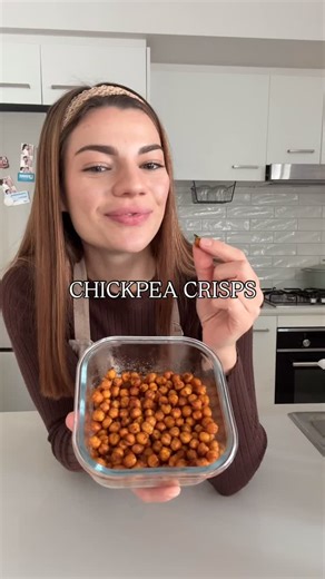 Charlize Mannino on Instagram: "Crispy chick pea crisps recipe! 🍿 Ingredients: • 1 can chickpeas, drained and rinsed • 1 tbsp olive oil • 1 tsp smoked paprika • 1/2 tsp garlic powder • 1/2 tsp onion powder • 1/2 tsp salt • 1/4 tsp black pepper Instructions: 1. Pat chickpeas dry with a clean kitchen towel or paper towels to remove as much moisture as possible. 2. In a bowl, toss chickpeas with olive oil, smoked paprika, garlic powder, onion powder, salt, and black pepper. 3. Air fry at 200°C. Sp