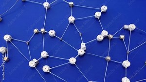 An abstract representation of a network showcasing connections and technology through circular nodes and lines against a blue backdrop.