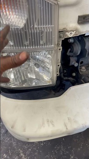 Isuzu npr headlight bulb replacement